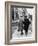 An Elderly Couple Walking Down the Street, Arm in Arm-Henry Grant-Framed Photographic Print