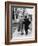 An Elderly Couple Walking Down the Street, Arm in Arm-Henry Grant-Framed Photographic Print