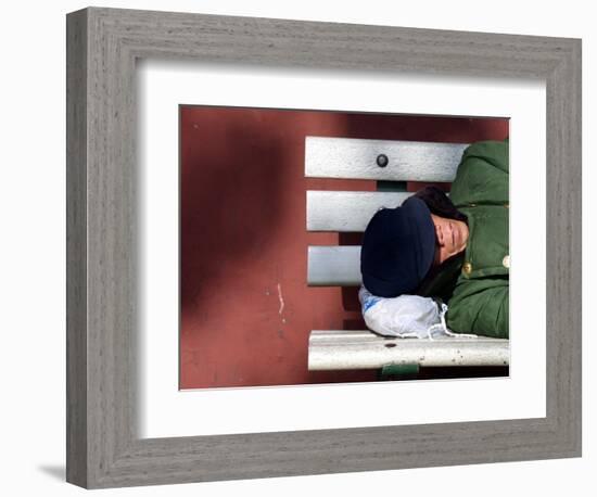 An Elderly Man Sleeps on a Bench Near Beijing's Tiananmen Square-null-Framed Photographic Print