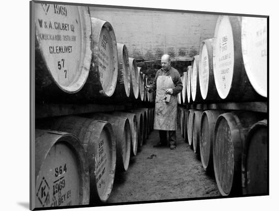 An Employee of the Knockando Whisky Distillery in Scotland, January 1972-null-Mounted Photographic Print