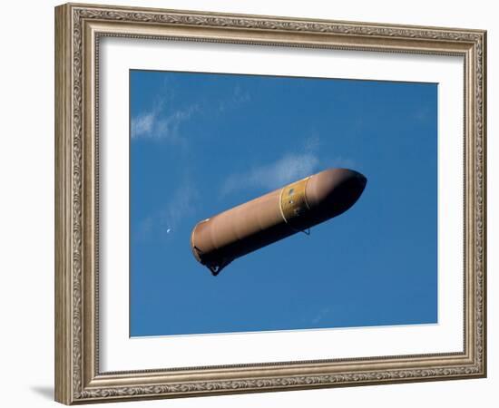 An External Fuel Tank Backdropped by a Blue And White Part of Earth-Stocktrek Images-Framed Photographic Print