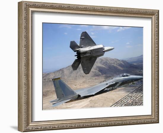 An F-22 Raptor Aircraft Turns Away While An F-15 Eagle Flies the Approach Over Nevada-Stocktrek Images-Framed Photographic Print