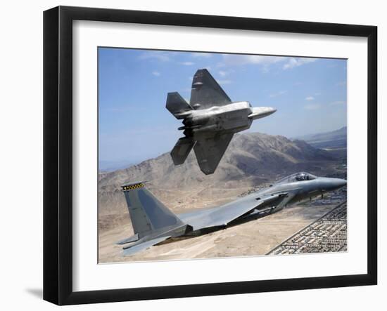 An F-22 Raptor Aircraft Turns Away While An F-15 Eagle Flies the Approach Over Nevada-Stocktrek Images-Framed Photographic Print