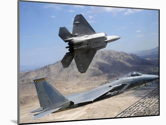 An F-22 Raptor Aircraft Turns Away While An F-15 Eagle Flies the Approach Over Nevada-Stocktrek Images-Mounted Photographic Print