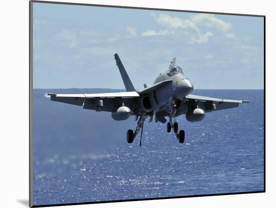 An F/A-18C Hornet Approaches the Flight Deck of the Aircraft Carrier USS Ronald Reagan-Stocktrek Images-Mounted Photographic Print