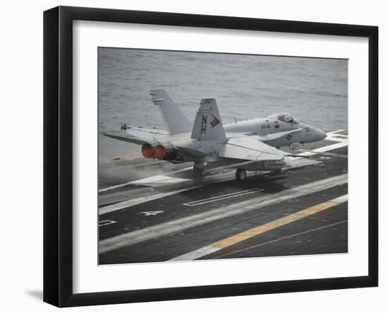 An F-A-18C Hornet Launches from the Aircraft Carrier USS Nimitz-null-Framed Photographic Print