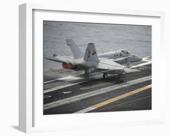 An F-A-18C Hornet Launches from the Aircraft Carrier USS Nimitz-null-Framed Photographic Print