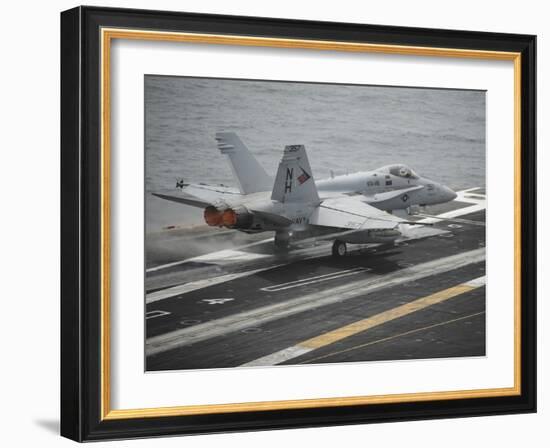 An F-A-18C Hornet Launches from the Aircraft Carrier USS Nimitz-null-Framed Photographic Print