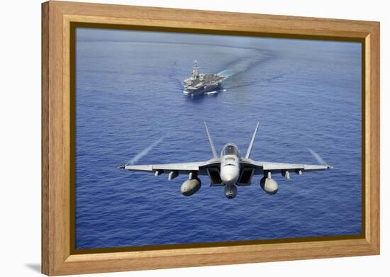 An F-A-18E Super Hornet Flying Above USS John C. Stennis-null-Framed Premier Image Canvas