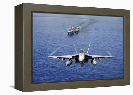 An F-A-18E Super Hornet Flying Above USS John C. Stennis-null-Framed Premier Image Canvas