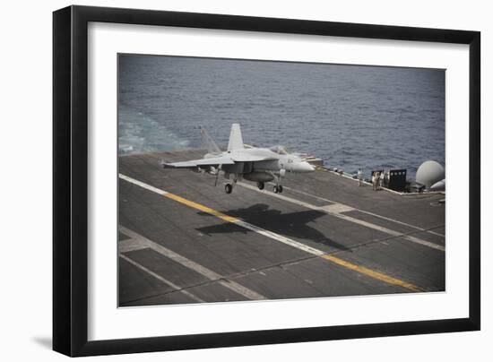 An F-A-18E Super Hornet Lands Aboard the Aircraft Carrier USS Nimitz-null-Framed Photographic Print