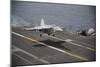 An F-A-18E Super Hornet Lands Aboard the Aircraft Carrier USS Nimitz-null-Mounted Photographic Print