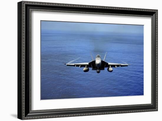 An F-A-18E Super Hornet over the Pacific Ocean-null-Framed Photographic Print