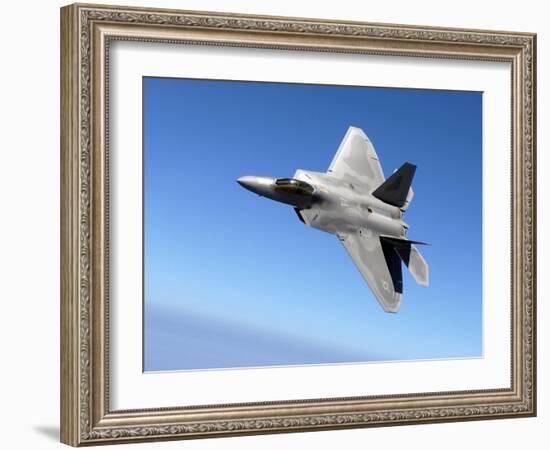 An F/A-22 Raptor Banks During a Training Sortie-Stocktrek Images-Framed Photographic Print