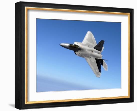 An F/A-22 Raptor Banks During a Training Sortie-Stocktrek Images-Framed Photographic Print