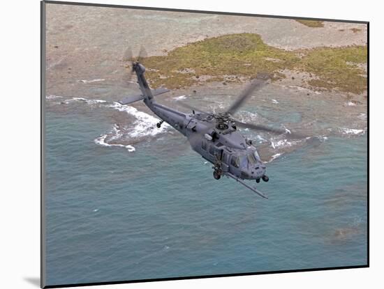 An HH-60G Pave Hawk Flies Along the Coastline of Okinawa, Japan-Stocktrek Images-Mounted Photographic Print