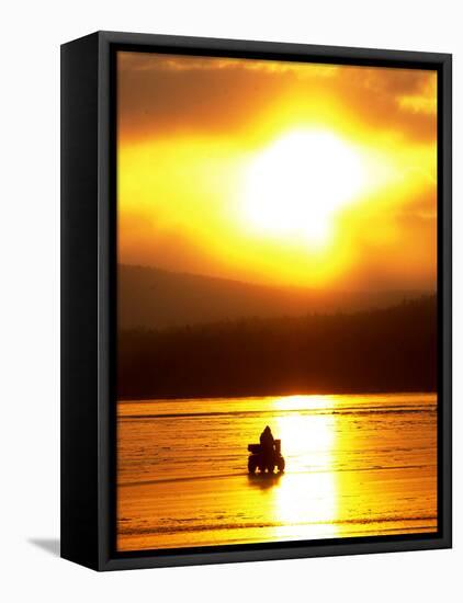 An Ice Fisherman Motors Across the Frozen Surface of Lake Champlain Near the Milton-South Hero, VT.-null-Framed Premier Image Canvas