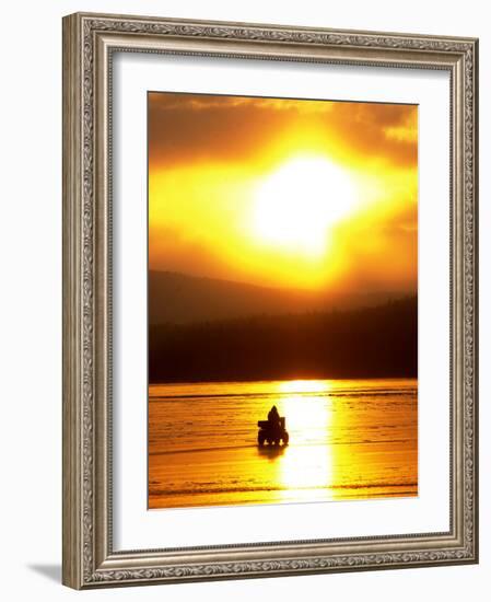 An Ice Fisherman Motors Across the Frozen Surface of Lake Champlain Near the Milton-South Hero, VT.-null-Framed Photographic Print