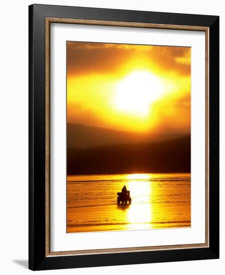 An Ice Fisherman Motors Across the Frozen Surface of Lake Champlain Near the Milton-South Hero, VT.-null-Framed Photographic Print