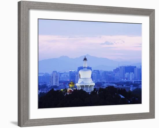 An Illuminated White Pagoda and City Buildings at Sunset, Beihai Park, Beijing, China-Kober Christian-Framed Photographic Print