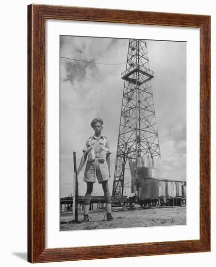 An Indian Army Guard Patroling the Kirkuk Oil Field-Dmitri Kessel-Framed Photographic Print