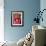 An Indian Woman Construction Worker Stacks Bricks on Her Head-null-Framed Photographic Print displayed on a wall