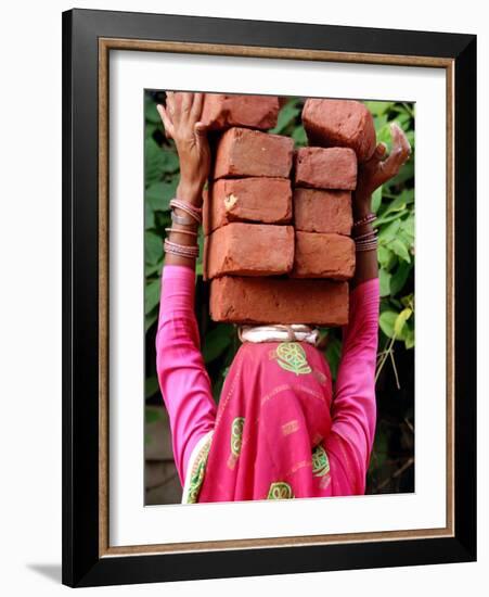 An Indian Woman Construction Worker Stacks Bricks on Her Head-null-Framed Photographic Print