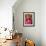 An Indian Woman Construction Worker Stacks Bricks on Her Head-null-Framed Photographic Print displayed on a wall