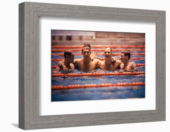 An Intercollegiate Team Locks Arms after Winning Medley Relay, 1964 Summer Olympics, Tokyo, Japa-Art Rickerby-Framed Photographic Print