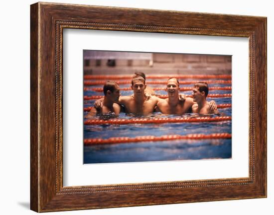 An Intercollegiate Team Locks Arms after Winning Medley Relay, 1964 Summer Olympics, Tokyo, Japa-Art Rickerby-Framed Photographic Print