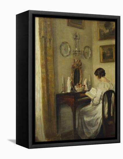 An Interior with a Girl Reading at a Desk-Carl Holsoe-Framed Premier Image Canvas