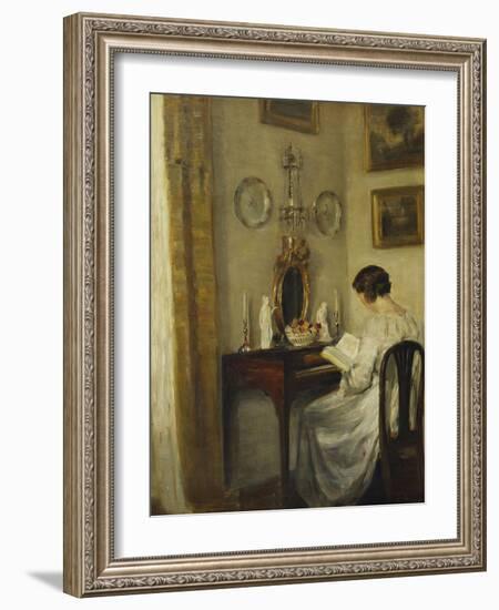 An Interior with a Girl Reading at a Desk-Carl Holsoe-Framed Giclee Print