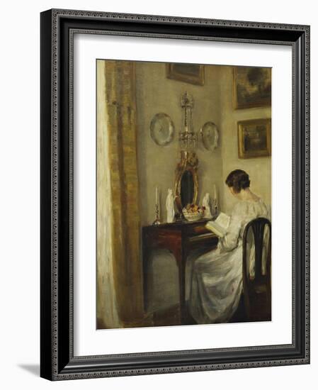 An Interior with a Girl Reading at a Desk-Carl Holsoe-Framed Giclee Print