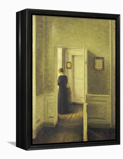 An Interior with a Woman, Painted in 1913-Vilhelm Hammershoi-Framed Premier Image Canvas