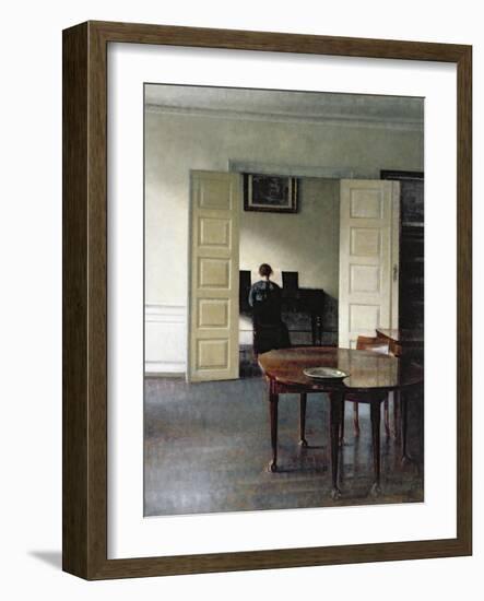 An Interior with a Woman Playing Piano, 1910-Vilhelm Hammershoi-Framed Giclee Print