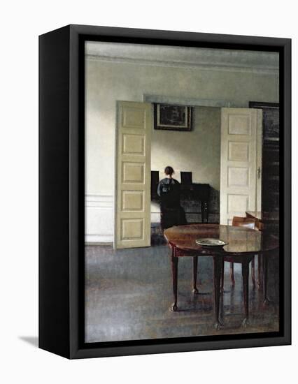 An Interior with a Woman Playing Piano, 1910-Vilhelm Hammershoi-Framed Premier Image Canvas