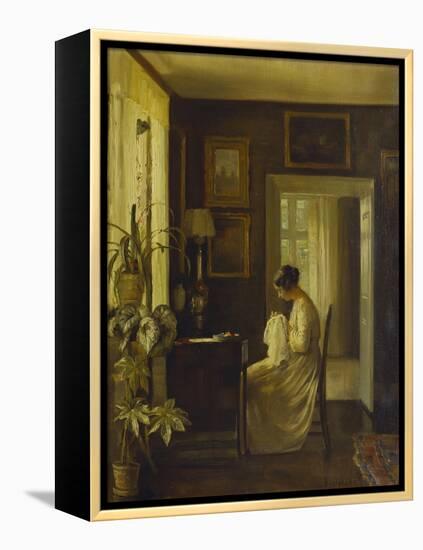 An Interior with a Woman Sewing-Carl Holsoe-Framed Premier Image Canvas