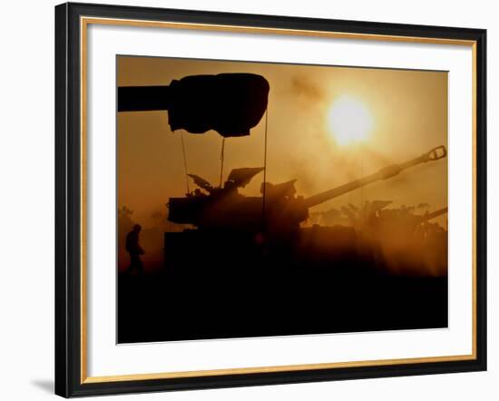 An Israeli Soldier Runs to Reload an Israeli Mobile Artillery Piece-null-Framed Photographic Print