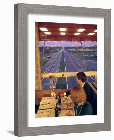 An Italian Couple Take their Supper in One of the Highway-Spanning Restaurant of the Pavesi Chain-Ralph Crane-Framed Photographic Print