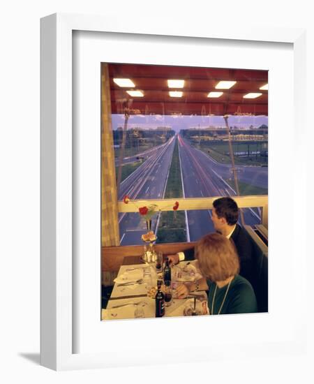 An Italian Couple Take their Supper in One of the Highway-Spanning Restaurant of the Pavesi Chain-Ralph Crane-Framed Photographic Print