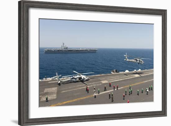 An Mh-60R Sea Hawk Helicopter Launches from USS Harry S. Truman-null-Framed Photographic Print