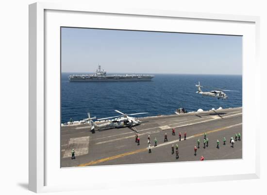 An Mh-60R Sea Hawk Helicopter Launches from USS Harry S. Truman-null-Framed Photographic Print