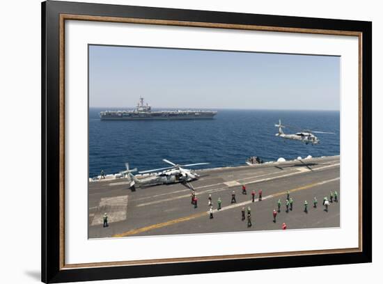 An Mh-60R Sea Hawk Helicopter Launches from USS Harry S. Truman--Framed Photographic Print