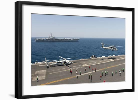 An Mh-60R Sea Hawk Helicopter Launches from USS Harry S. Truman-null-Framed Photographic Print