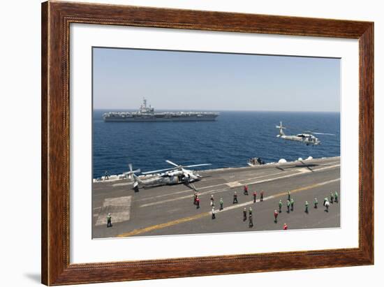 An Mh-60R Sea Hawk Helicopter Launches from USS Harry S. Truman-null-Framed Photographic Print