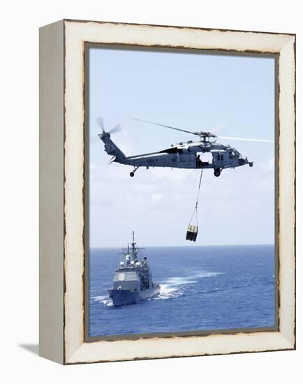 An Mh-60S Sea Hawk Helicopter Flying in Front of USS Gettysburg-null-Framed Premier Image Canvas