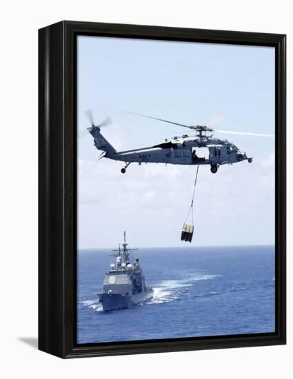 An Mh-60S Sea Hawk Helicopter Flying in Front of USS Gettysburg-null-Framed Premier Image Canvas