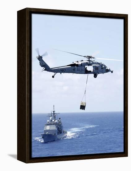 An Mh-60S Sea Hawk Helicopter Flying in Front of USS Gettysburg-null-Framed Premier Image Canvas