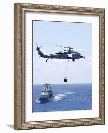 An Mh-60S Sea Hawk Helicopter Flying in Front of USS Gettysburg-null-Framed Photographic Print