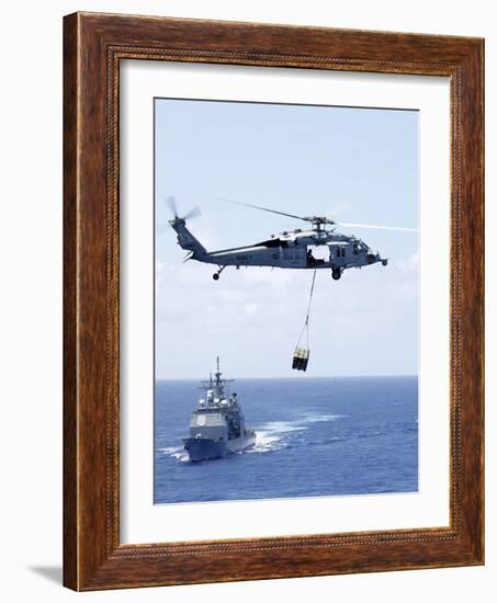 An Mh-60S Sea Hawk Helicopter Flying in Front of USS Gettysburg-null-Framed Photographic Print